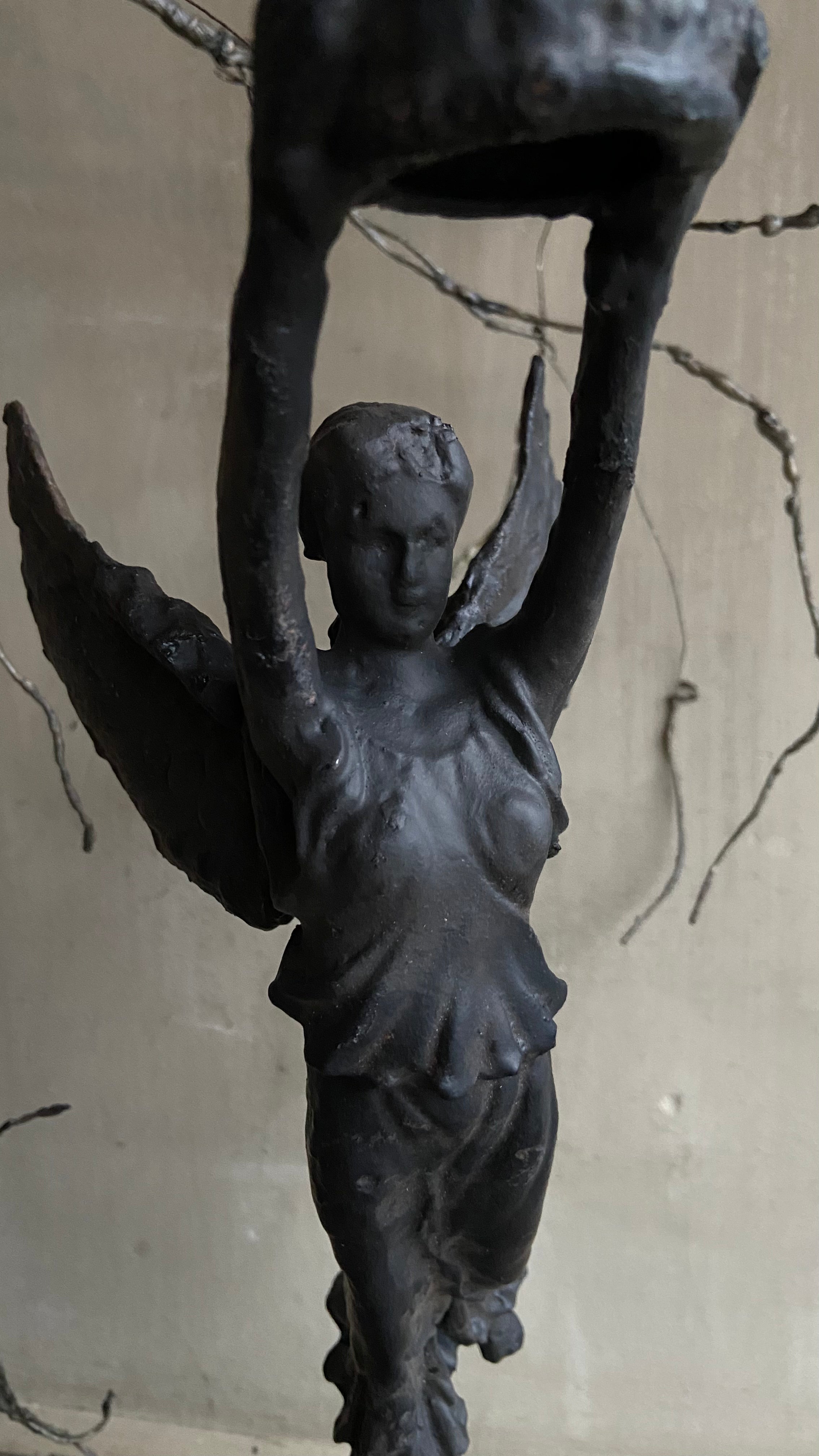 Detail gezicht gietijzeren engel